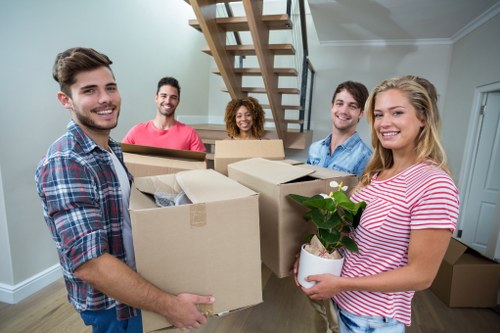 Loading furniture into a van during a Westminster move