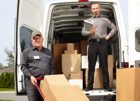 Man with a van service in Westminster loading furniture