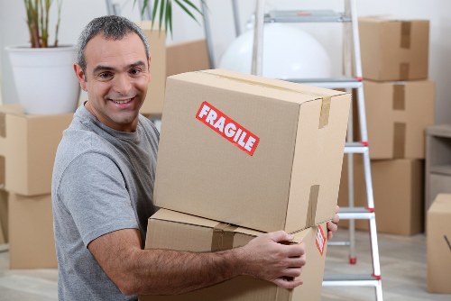 Professional removals team planning a move in Westminster street