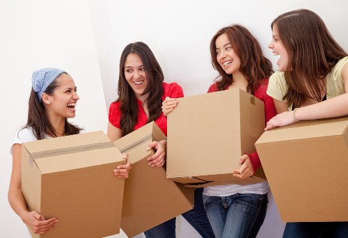 Experienced movers preparing furniture for a Westminster move