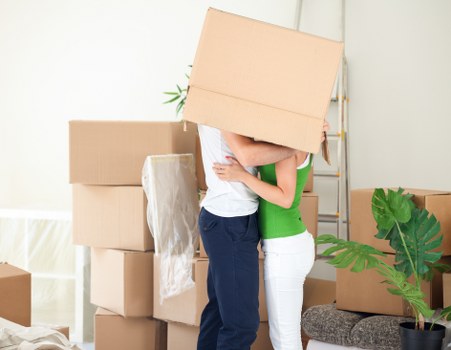 Waste and packaging being sorted for lawful disposal during a move