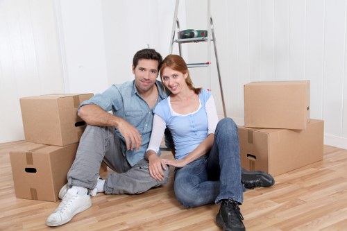 Removal van with furniture being loaded for transport