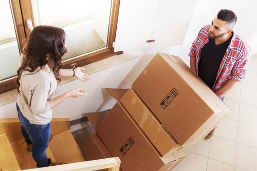 Professional house removals team handling bulky items in Westminster