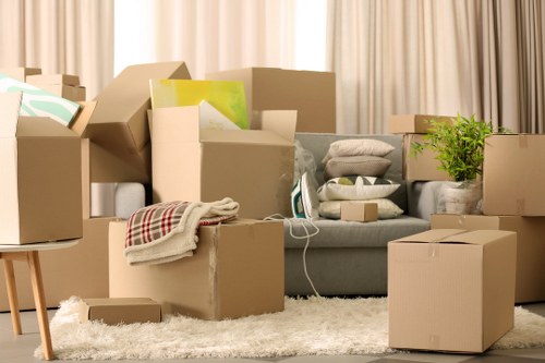 Moving crew protecting furniture during a Westminster relocation