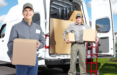 Moving crew using careful handling techniques during a property relocation