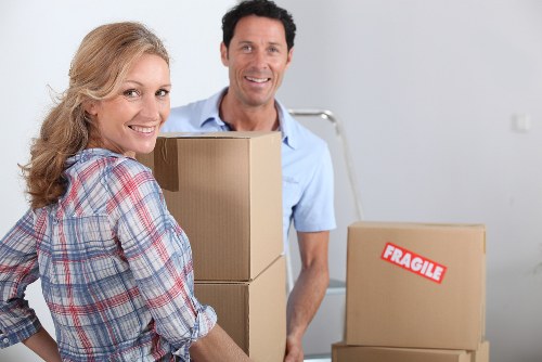 Packed boxes and furniture ready for removals in a Westminster flat